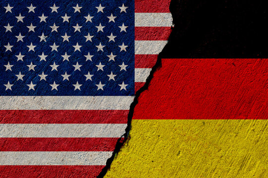 usa and germany flags painted on concrete wall
