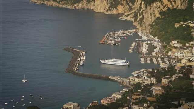 Ferry boat enter in port in Capri, Timelapse Italy.