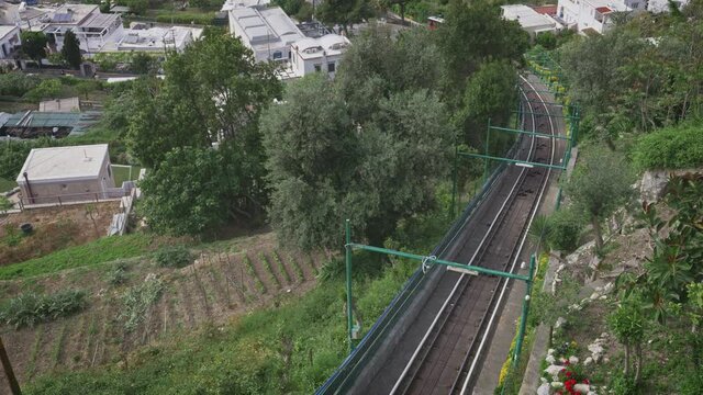 Round trip of the funicolar train in Capri. Timelapse similat to tilt and shift effect.