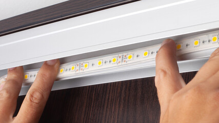 installation of decorative LED strip. diode line mounting