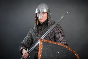 Portrait of a medieval warrior of the late Viking era and the beginning of the Crusades. Knight in...