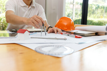 Engineer and Architect concept, Engineer Architects  and Interior designer working with blueprints