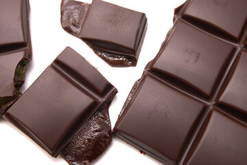 Dark chocolate bar, isolated on white background, top view.