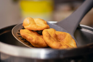 fried cake typical and traditional Argentine food of masa flour and sugar