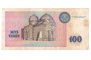 Fototapeta premium The reverse of the banknote of the Republic of Kazakhstan in one hundred tenge in purple-lilac tones, sample of 1993 with the image of the Mausoleum of Khoja Ahmed Yasawi. Business concept.