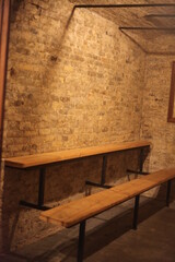 old wooden table and chair, BRICK WALL