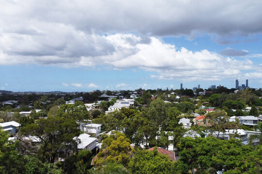 South East Queensland suburb taken from a drone showing houses, city and treescapes