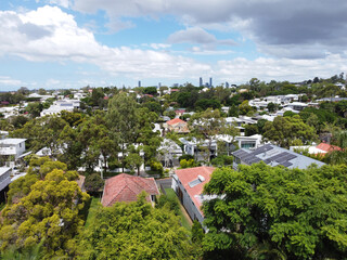 South East Queensland suburb taken from a drone showing houses, city and treescapes