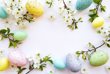 Colorful Easter eggs with spring blossom flowers