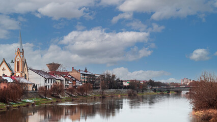 A river in the middle of an old town in Romania