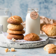Freshly baked homemade crunchy cream cheese cookies. A delicious treat for gourmets. Biscuits on a grey concrete background. Biscuit.  Biscuits texture