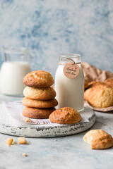Freshly baked homemade crunchy cream cheese cookies. A delicious treat for gourmets. Biscuits on a grey concrete background. Biscuit.  Biscuits texture