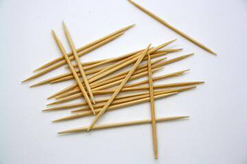 Wooden toothpicks isolated on a white background.