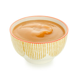 Bowl with sweet apple jam on white background