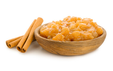 Plate with sweet apple jam and cinnamon on white background