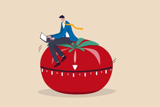 Pomodoro technique to increase work productivity, set timer to focus work and break or rest concept, smart businessman focus on working with laptop computer sitting on Pomodoro tomato timer stopwatch.