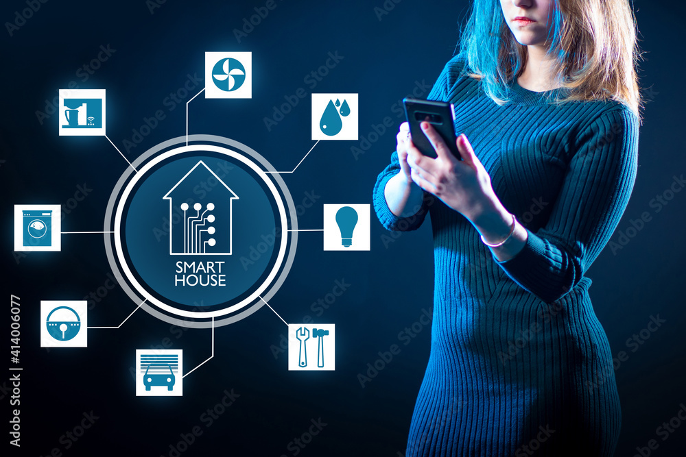 Aufkleber the girl controls the smart home from her smartphone. a woman with a mobile phone next to the circul