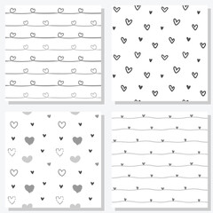 Set of 4 Seamless Patterns with Hand Drawn Heart Design on White Backgrounds