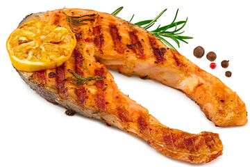 slice of grilled fish, salmon, trout, steak with rosemary on black plate isolated on white background, clipping path