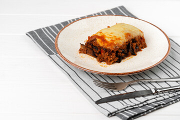 Piece of fresh meat lasagna with cheese