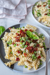 ealthy home made ricotta pasta with bacon and peas