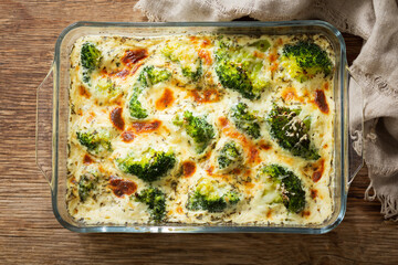 Casserole broccoli. Baked broccoli with cheese and cream sauce, top view