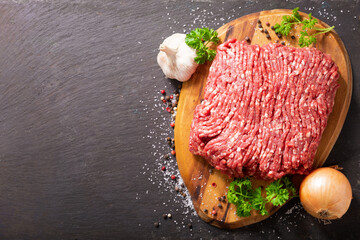 minced meat with ingredients for cooking, top view