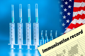 Immunization campaign in the United States. Syringes, ampoules and a vaccination certificate on the background of the American flag. Vaccination in America. Vaccinations against dangerous diseases.