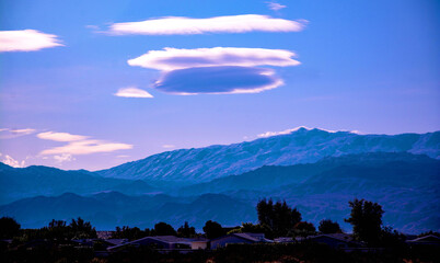 NLO Shaped Clouds over Mountains