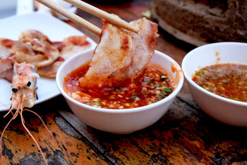 Thai barbecue Grill Pork on hot pan buffet, Moo-gata Pork pan It's traditional Thai style BBQ.