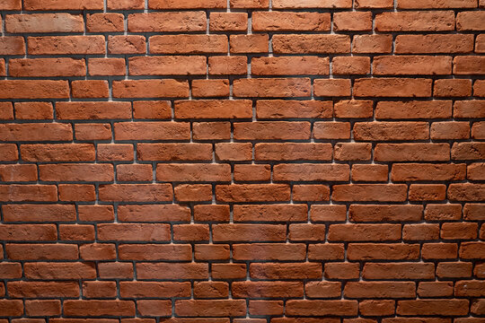 ceglana ściana, z czerwonej palonej starej rustykalnej cegły