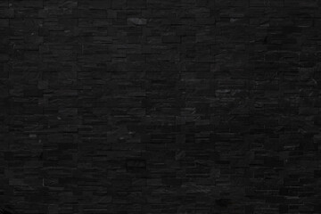 Abstract Dark Black brick wall texture for background. Brickwork background for Interior. natural black stone wallpaper with high resolution.