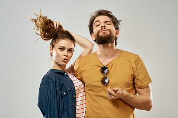 Young couple lifestyle emotions communication fashion light background