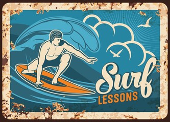Surf lessons rusty metal plate with man surfing board on seascape background with gulls. Vector vintage rust tin sign for surfer classes educational service, retro poster, ferruginous promotional card