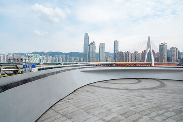 Obraz na płótnie Canvas Empty floor and modern city buildings in Chongqing, China