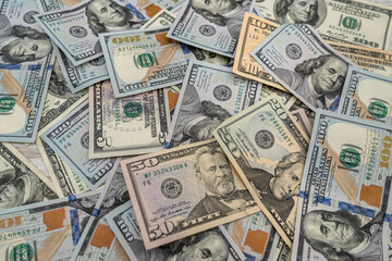 pile of american money 100 dollar bills as background