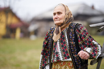 Fototapeta premium Old Romanian woman outdoor
