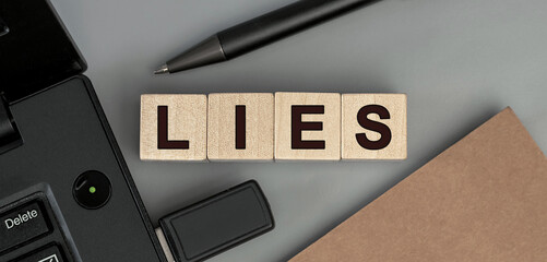 lies - word concept from wooden blocks. Top view