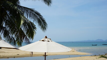an umbrella at the Khlong Muang Beach in Nong Thale, Krabi, Southern Thailand, March