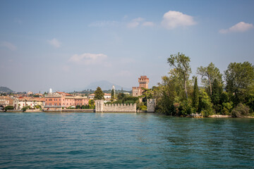 View of Sirmione from Lake Garda. Autumn sunny evening. Sirmione, Lombardy, Italy