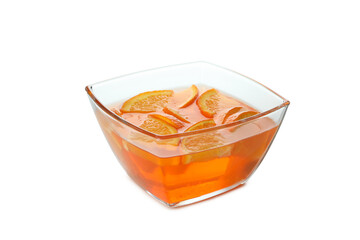 Bowl of orange jelly isolated on white background
