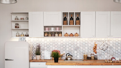 White modern kitchen. A mixture of rustic, Scandinavian and modern styles. Realistic kitchen - location in a photo studio.