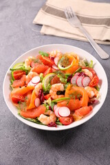 smoked salmon salad with shrimp, radish, avocado