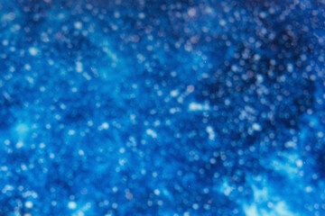 blue water background blurred at depth