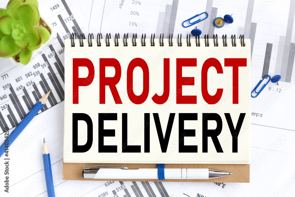 Poster project delivery. text on white notepad paper on light background