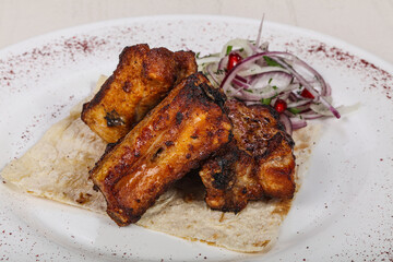 Grilled pork steak with bone