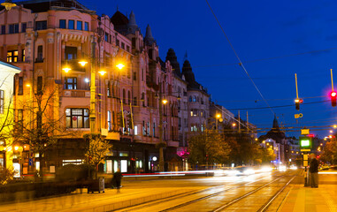 Fototapeta na wymiar Nightlife of illuminated central Debrecen streets, Hungary