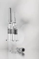 Influenza vaccine in prefilled syringes on gray background. 3D rendering illustration.