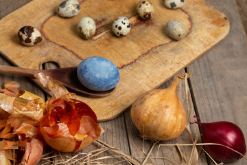 Easter tradition of painting eggs at home with onion peel. Easter holidays concepts