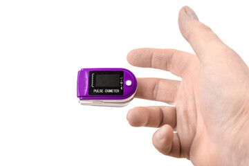 Close up Finger with Pulse Oximeter Measurement. Reduced oxygenation is an emergency sign of pneumonia, for instance caused by coronavirus. Pulse oximeter and hend isolated on white background.